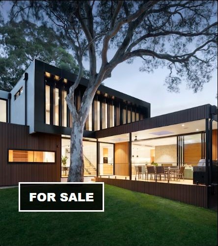 Modern home for sale at dusk